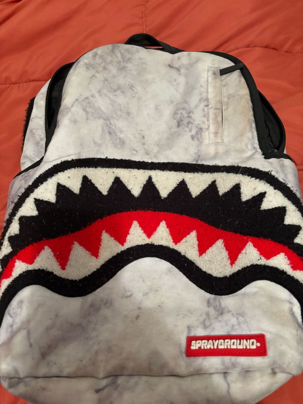 Sprayground Marble Shark Backpack in White, Black, Red